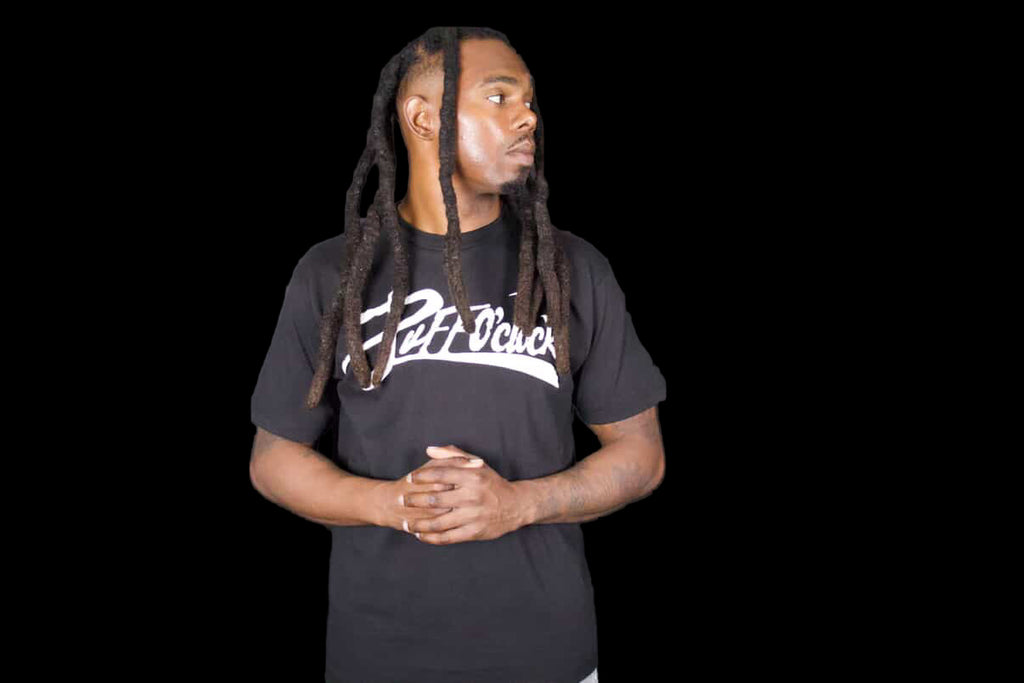 Black PuffoClock Luxe Tee